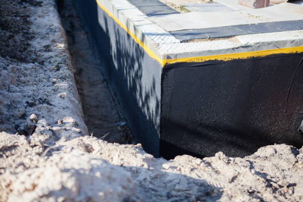 Professional Waterproofing technician working in Greenville, SC